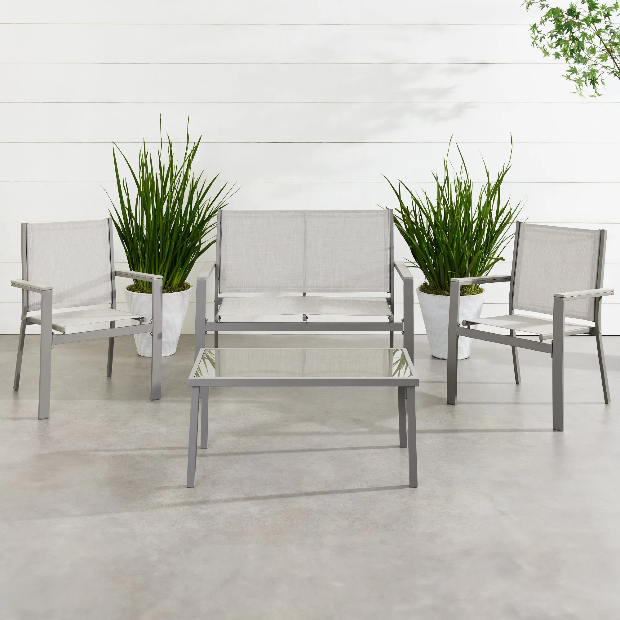 4-Piece Textilene Outdoor Conversation Set w/ Cushions, Table