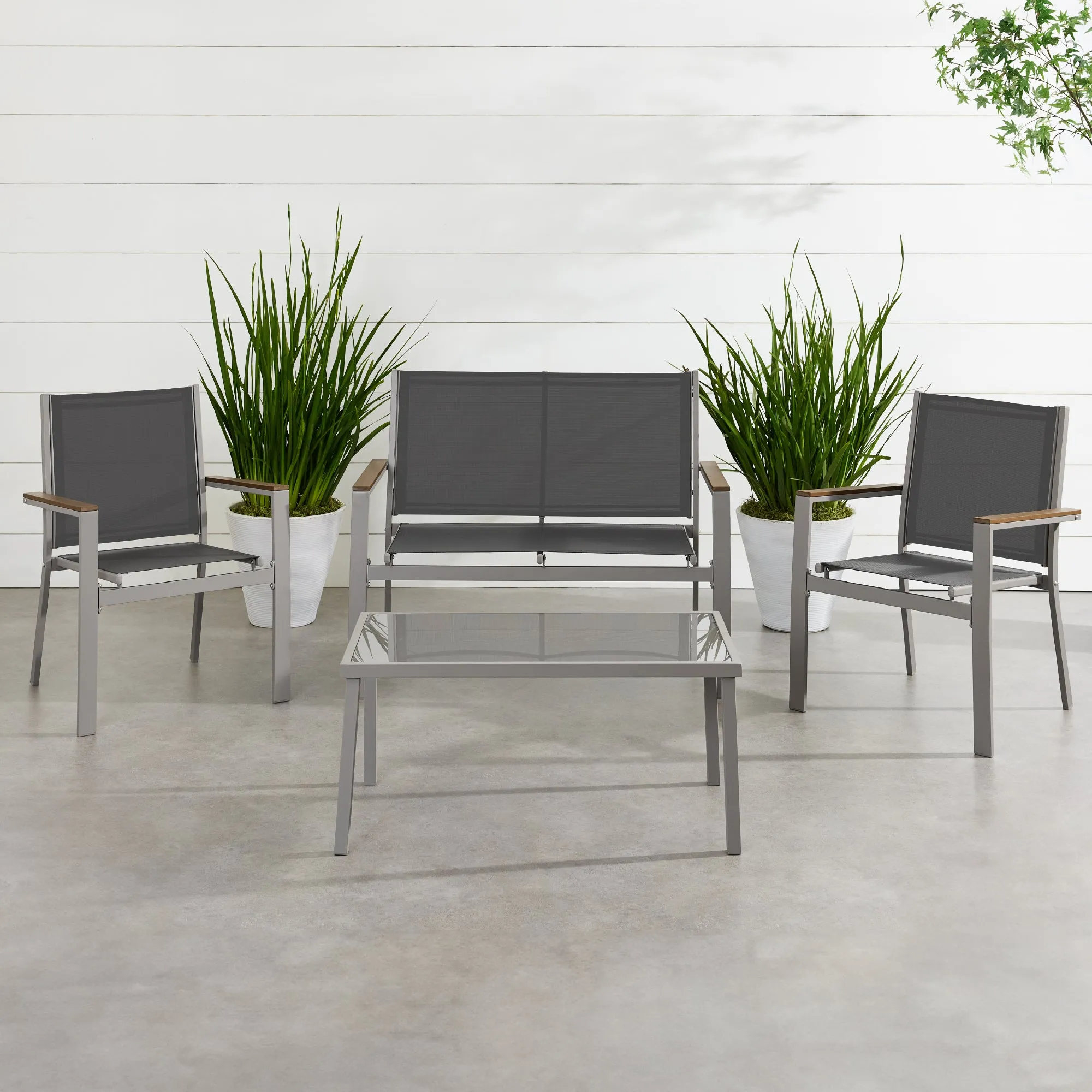 4-Piece Textilene Outdoor Conversation Set w/ Cushions, Table