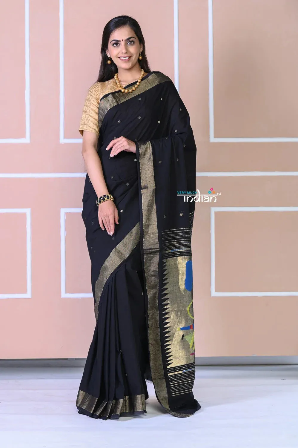 Authentic Handloom Cotton Paithani In Black Color And Golden Instrumental Pallu